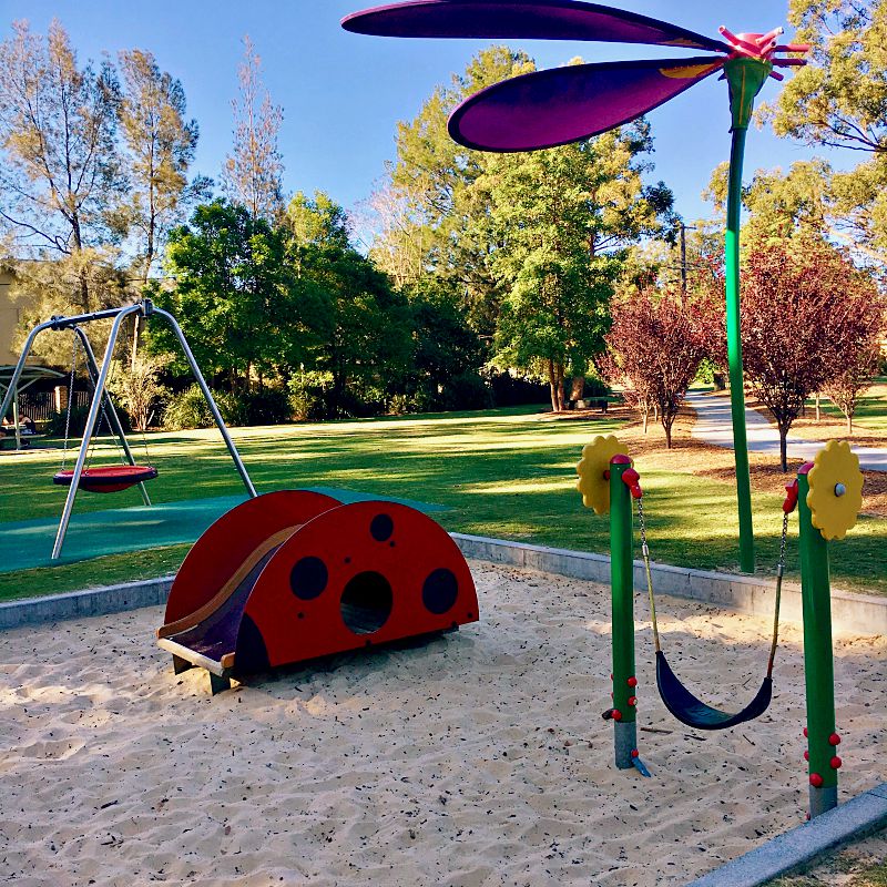 Tots will Love the Ladybird Slippery Dip and Wombat Log Tunnel at Elizabeth Ross Park, East Gosford