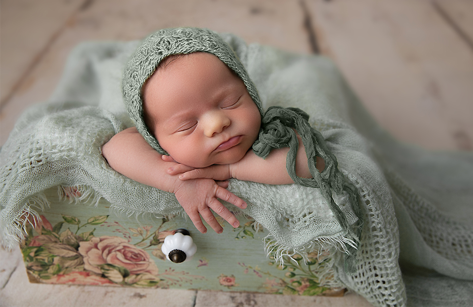 Capture your tiny baby’s first moments forever in a beautiful keepsake from Bellebird Photography!