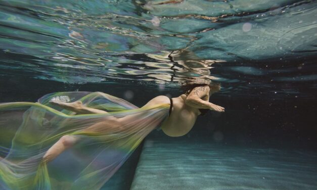 Dear Juniper Photography does underwater family and maternity photos and the results are beautifully ethereal